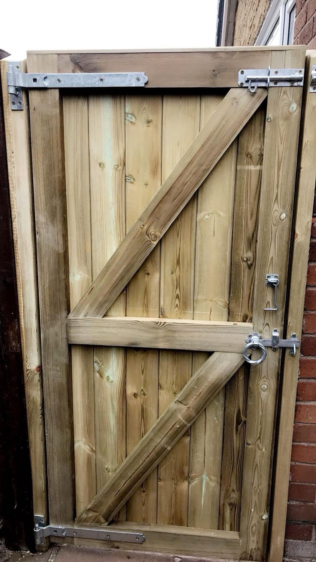 Bespoke framed, ledged and braced timber pedestrian gate on galvanised strap hinges